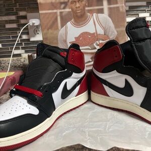 Nike Air Jordan 1 High OG in Black, White, and Red